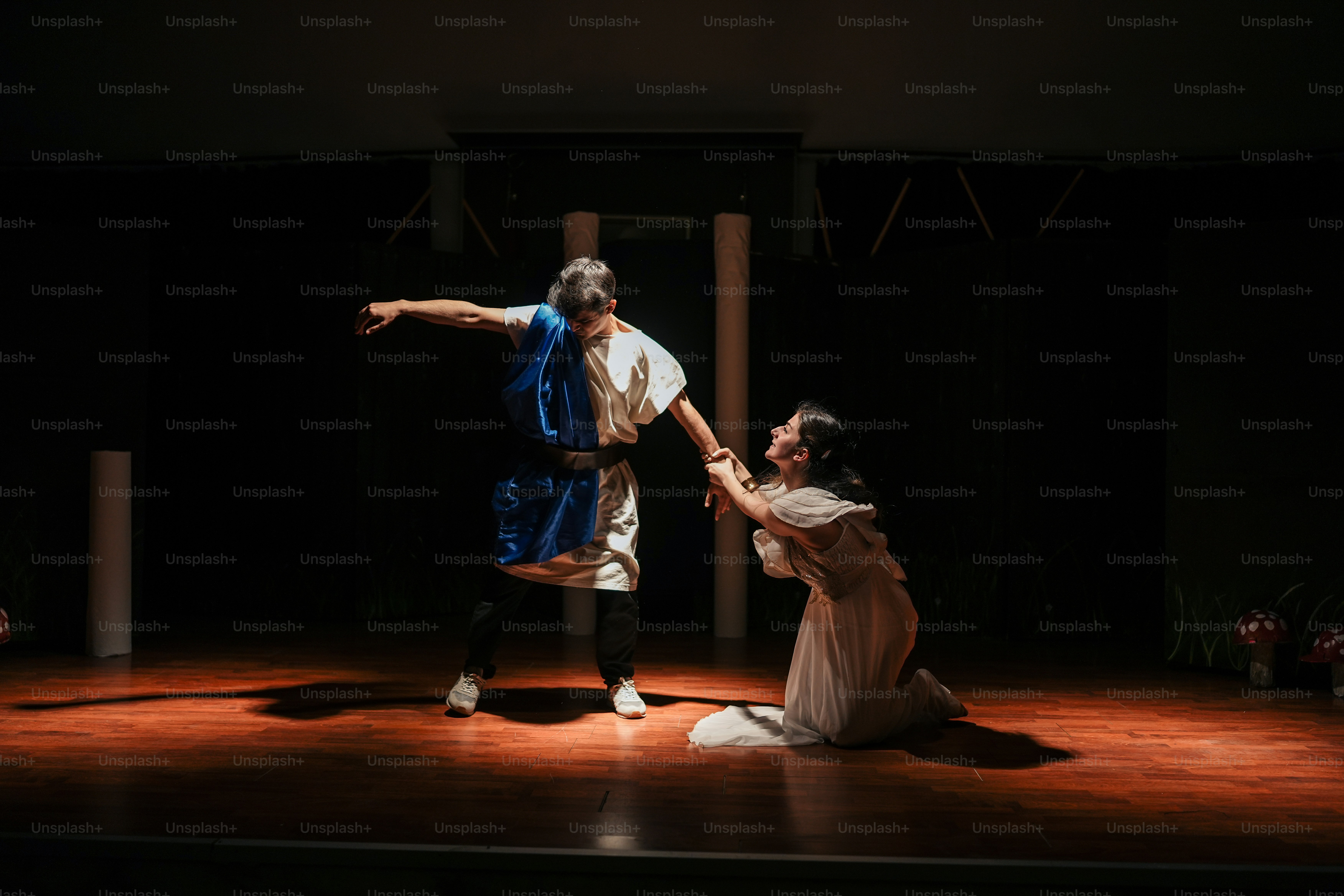 a couple of people that are on a stage