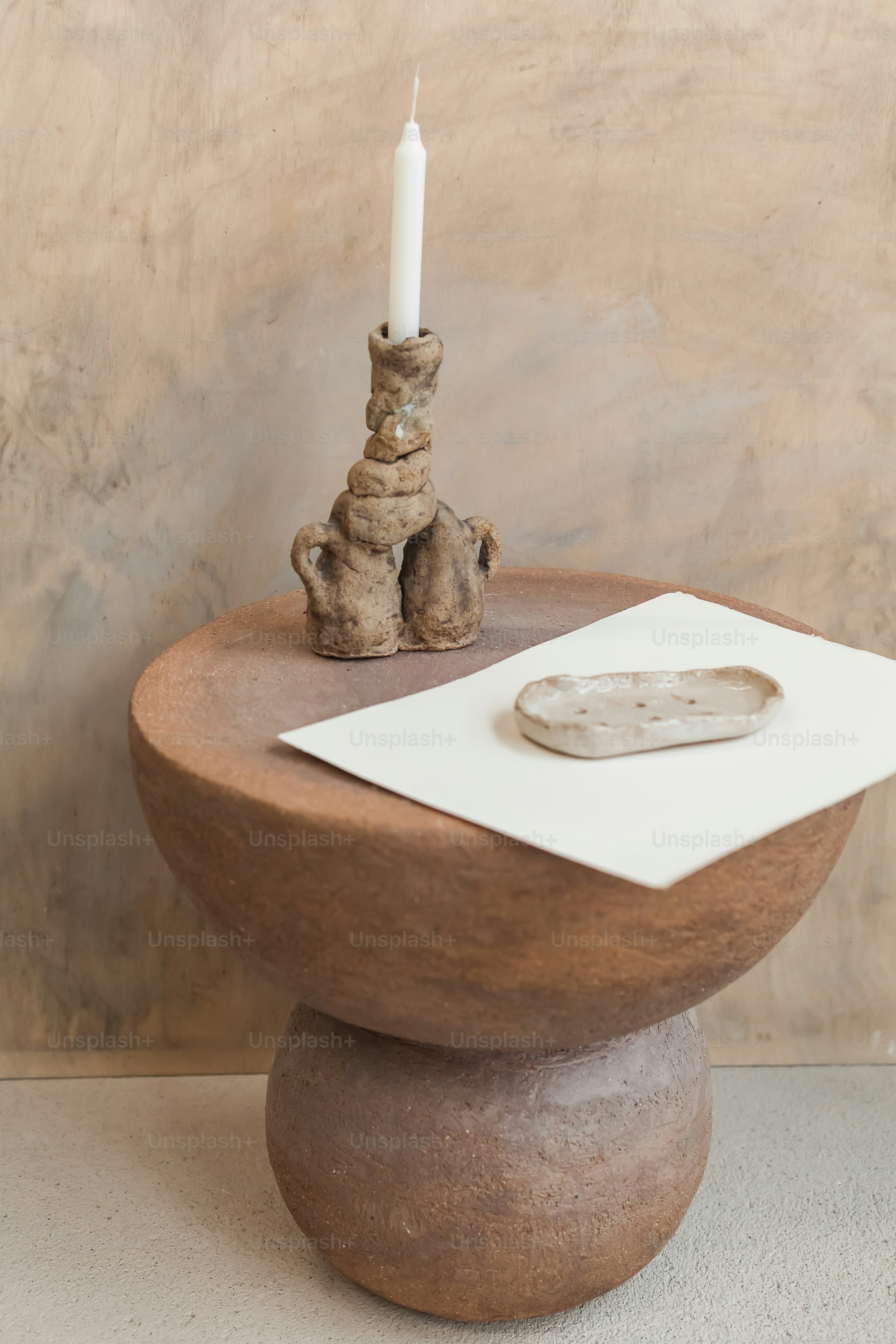 A white vase sitting on top of a wooden stand photo – Texture Image on ...