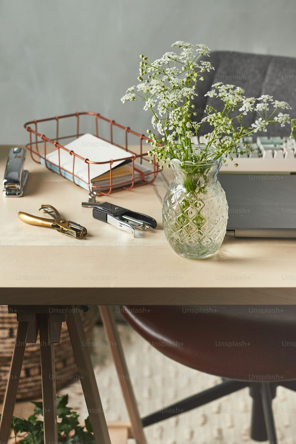 a vase of flowers sitting on a table