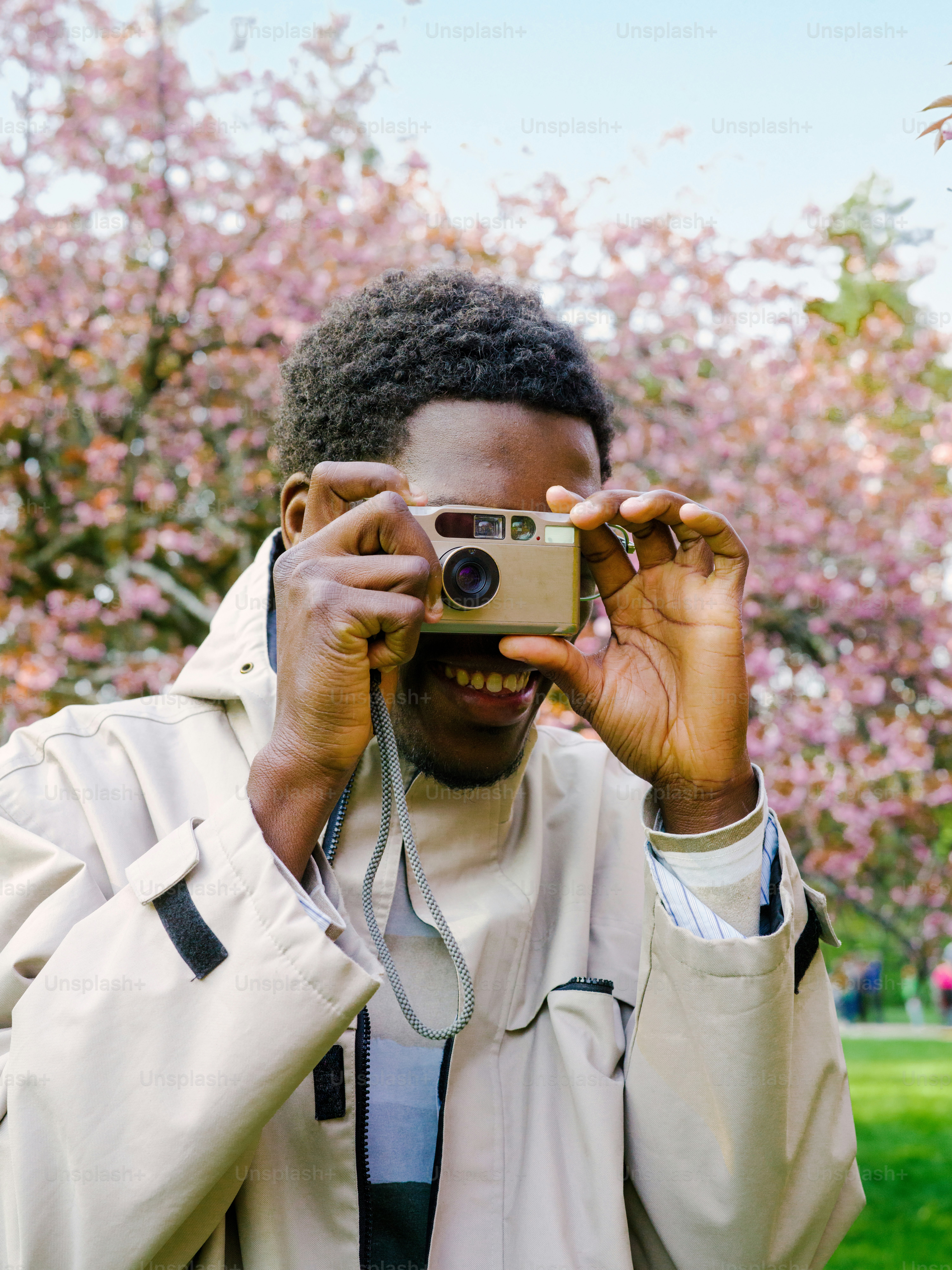 a man taking a picture with a camera