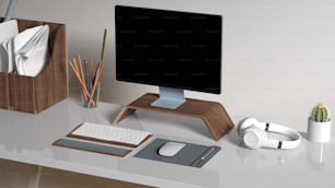 a computer monitor sitting on top of a desk