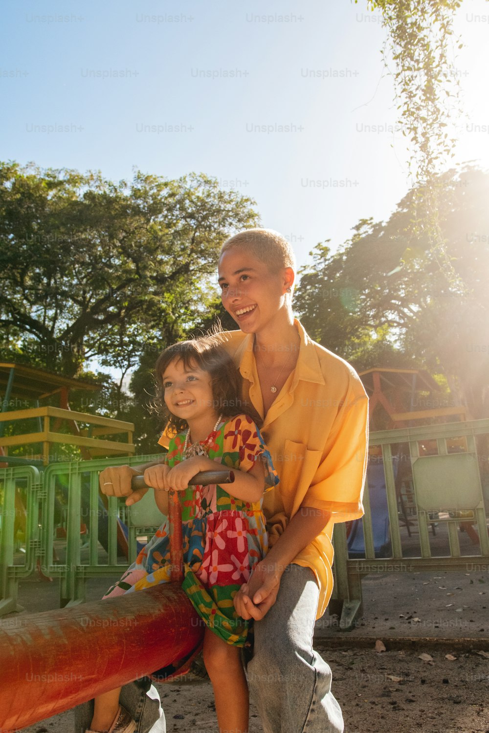 a man and a little girl posing for a picture