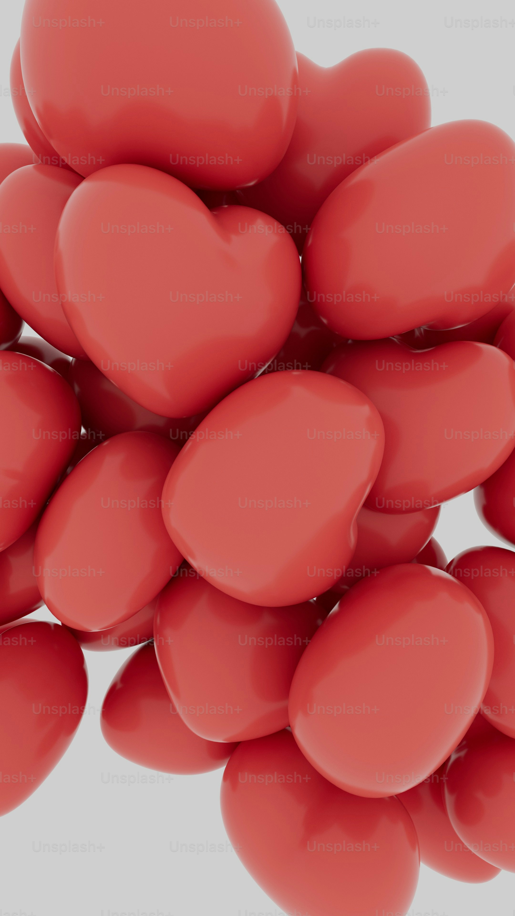 공중에 떠 있는 붉은 하트 한 무리