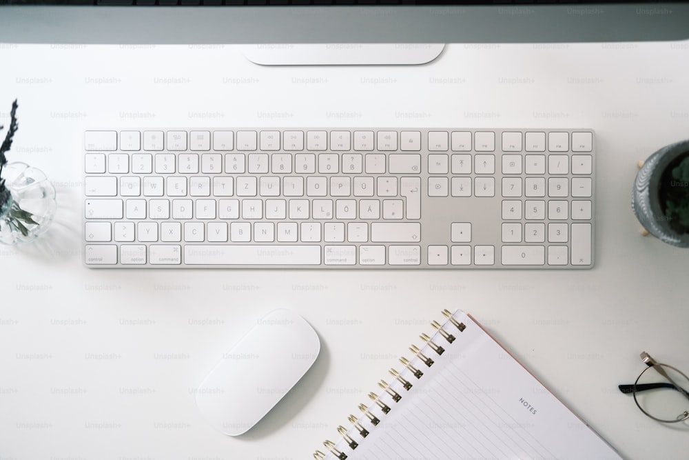 a keyboard and a mouse on a desk