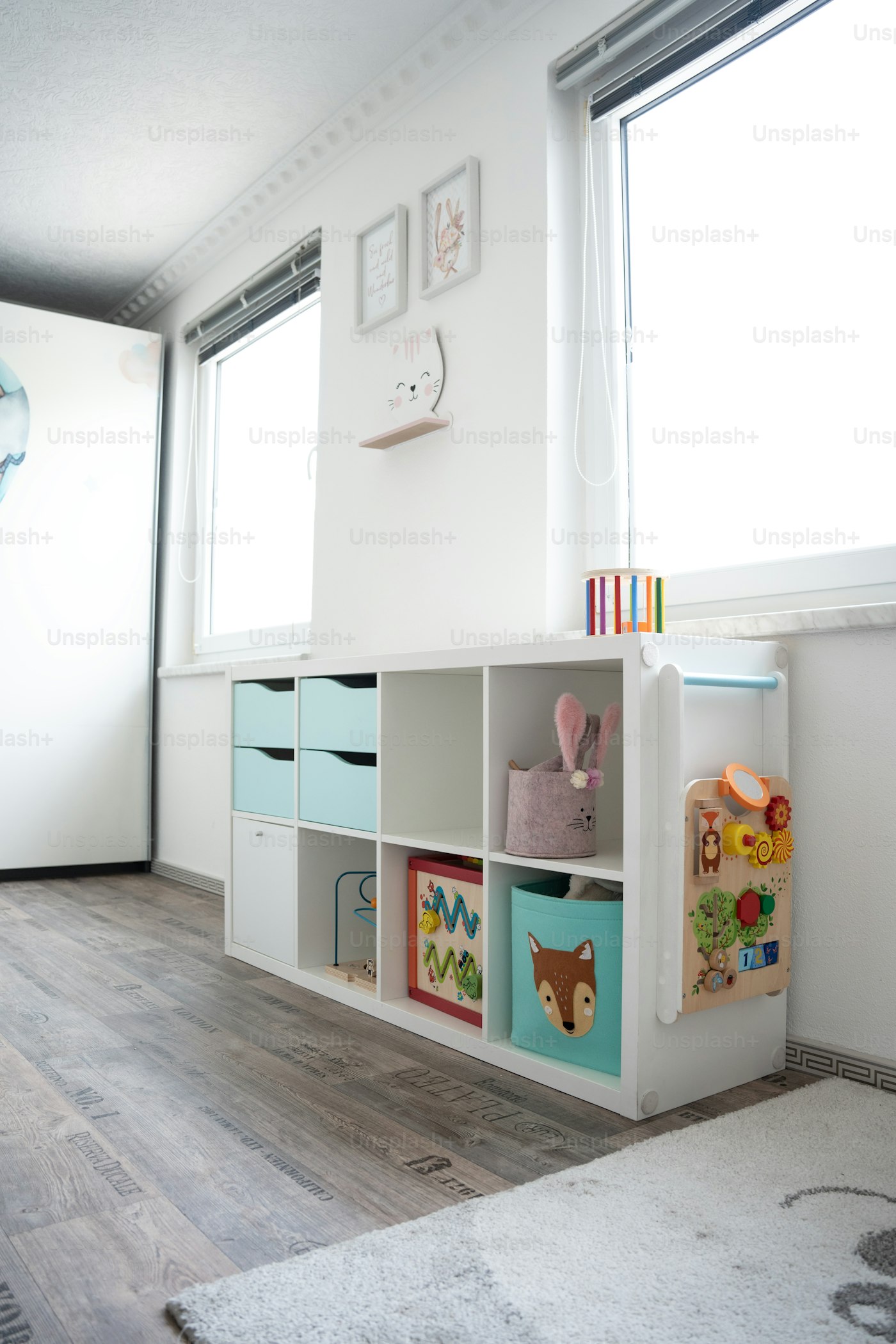 Playroom cubbies with tidy toy storage bins