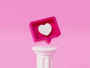 um objeto rosa com um coração branco em uma bolha de fala