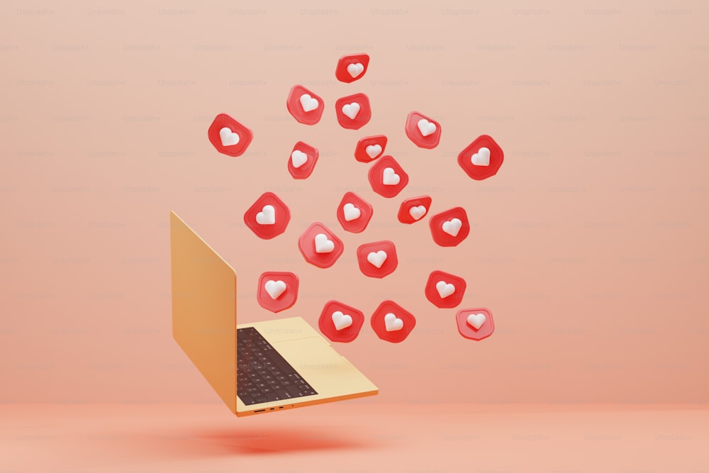 a laptop with hearts coming out of it