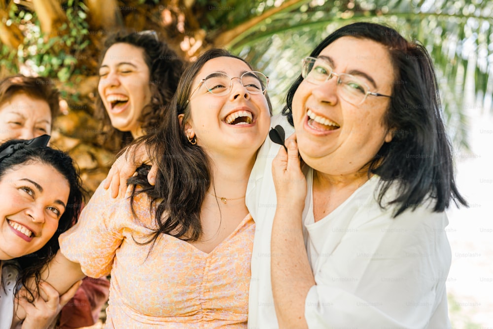 a group of women standing next to each other