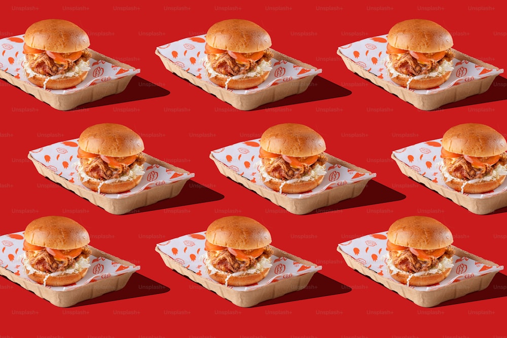 a bunch of sandwiches sitting on top of a tray