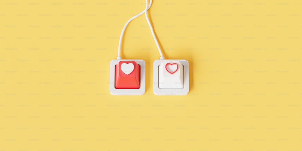 a pair of red and white tags with a heart on them