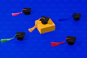 graduation caps and tassels on a blue background