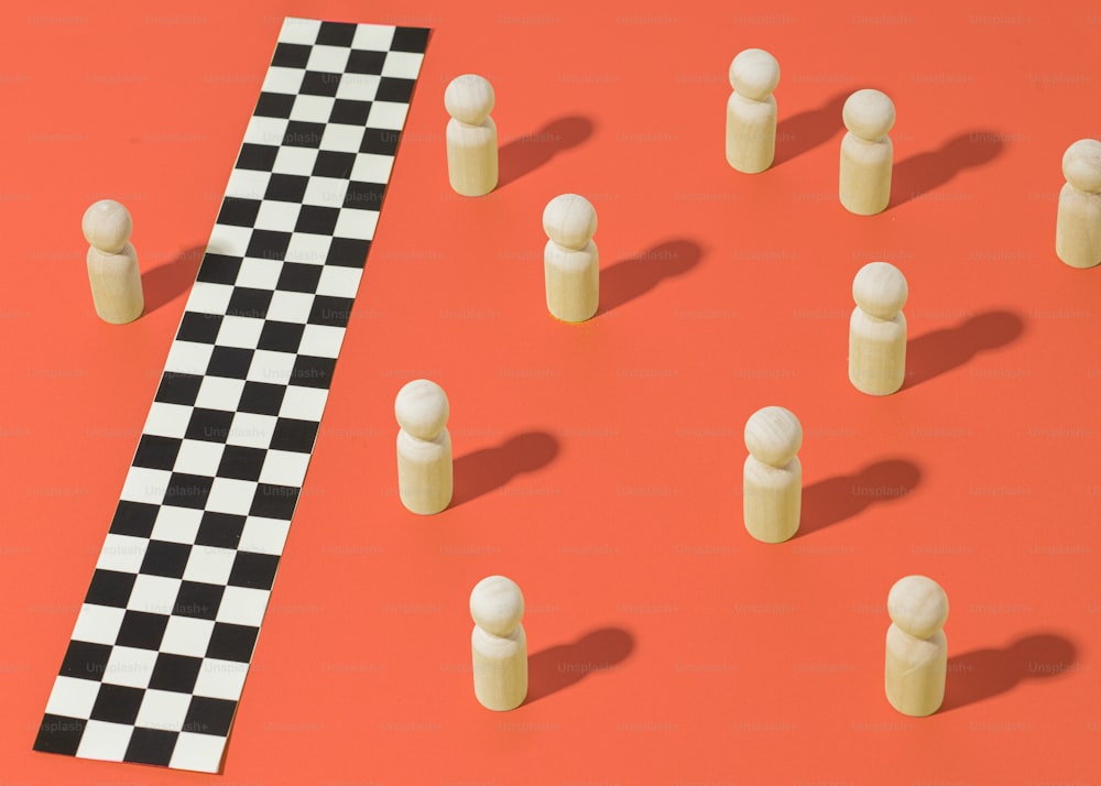 a black and white checkerboard pattern on a red surface