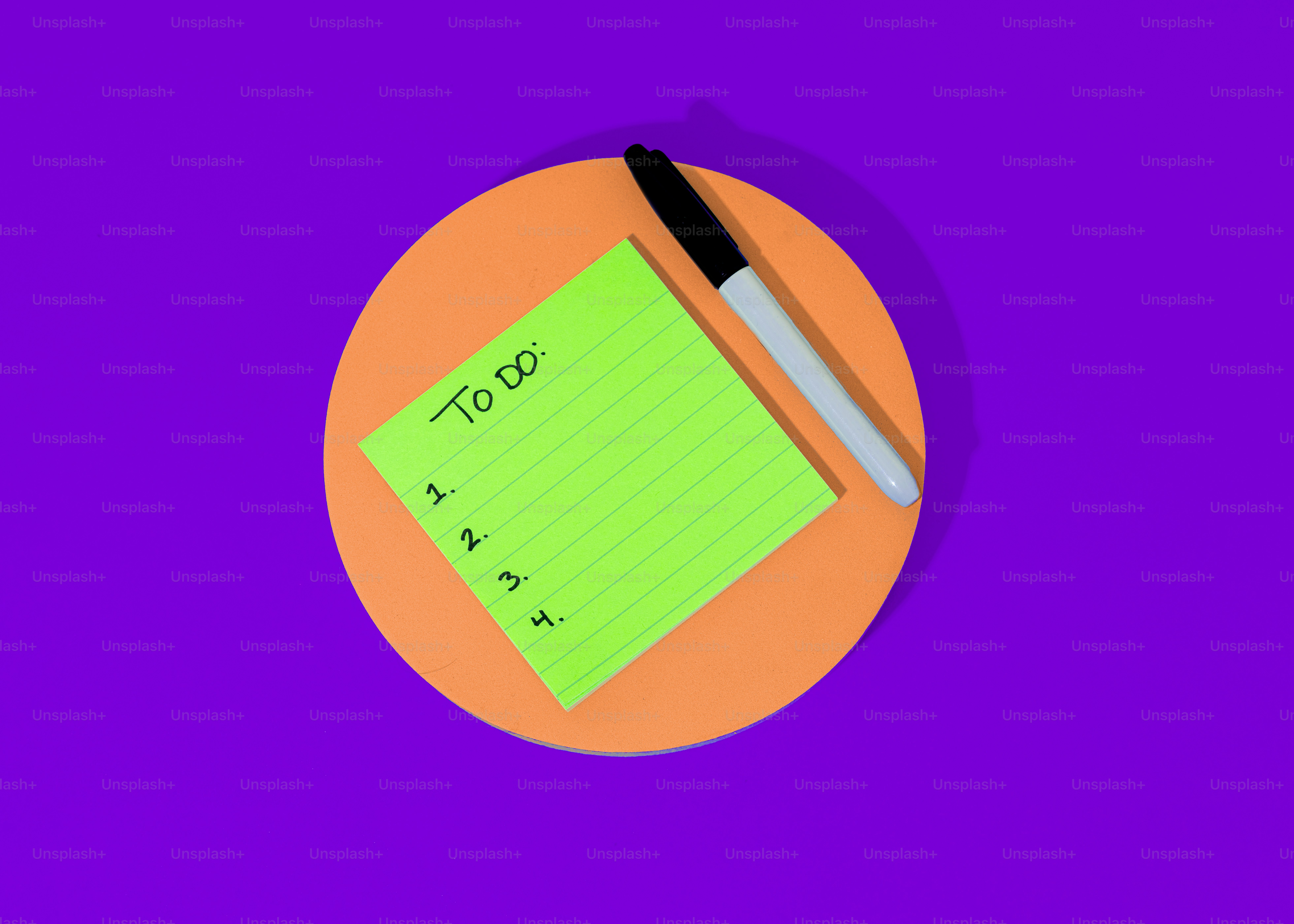 a piece of paper on a plate with a pen