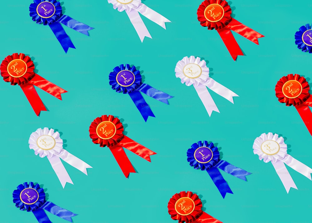a group of red, white, and blue ribbons on a blue background