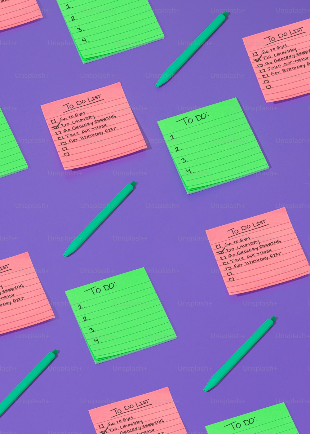 a bunch of sticky notes on a purple surface