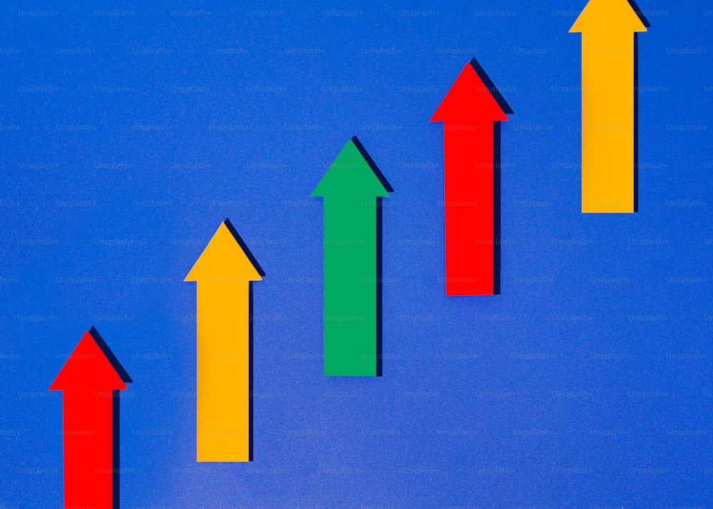a row of colorful arrows on a blue background