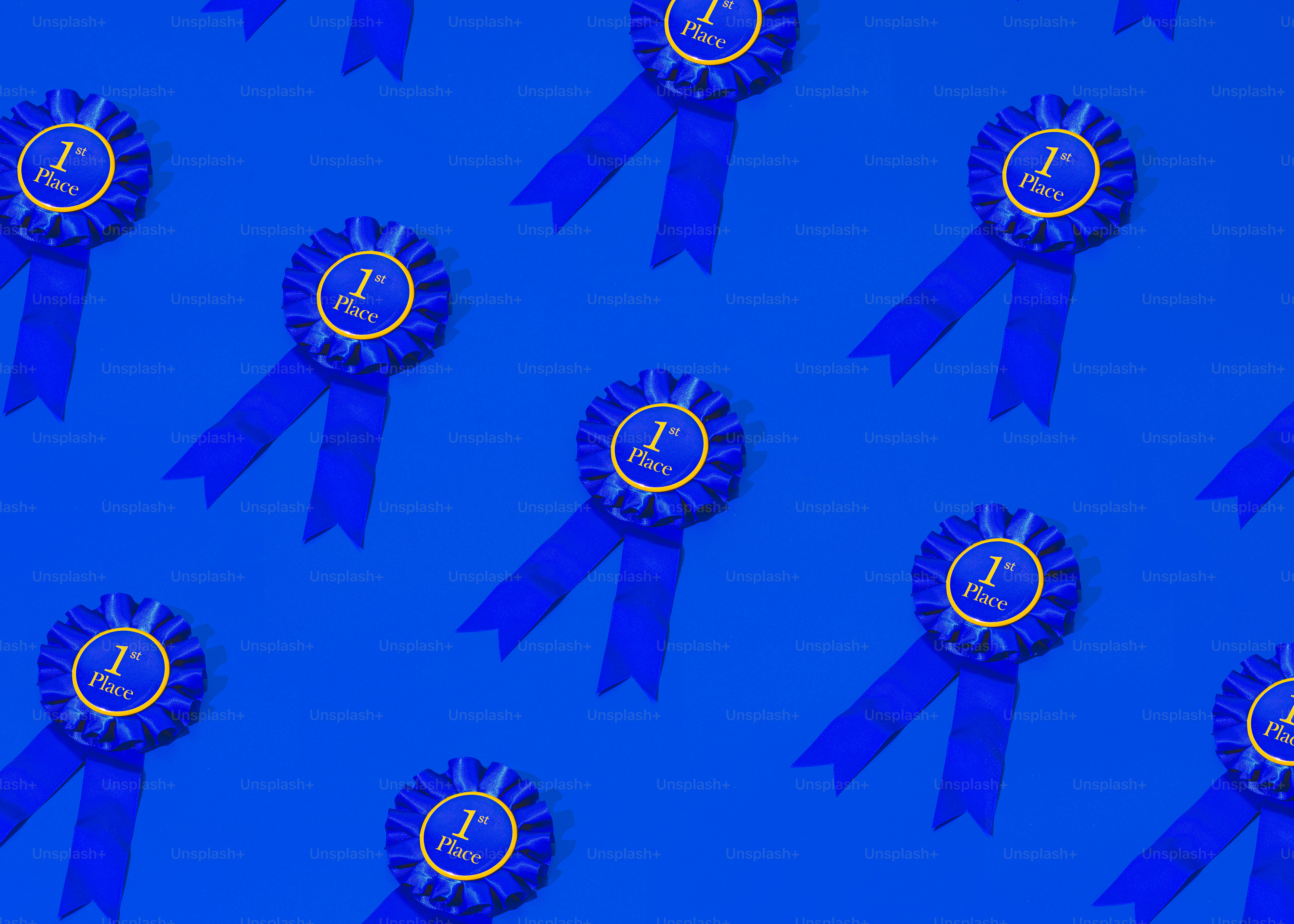 a group of blue ribbons with a clock on them