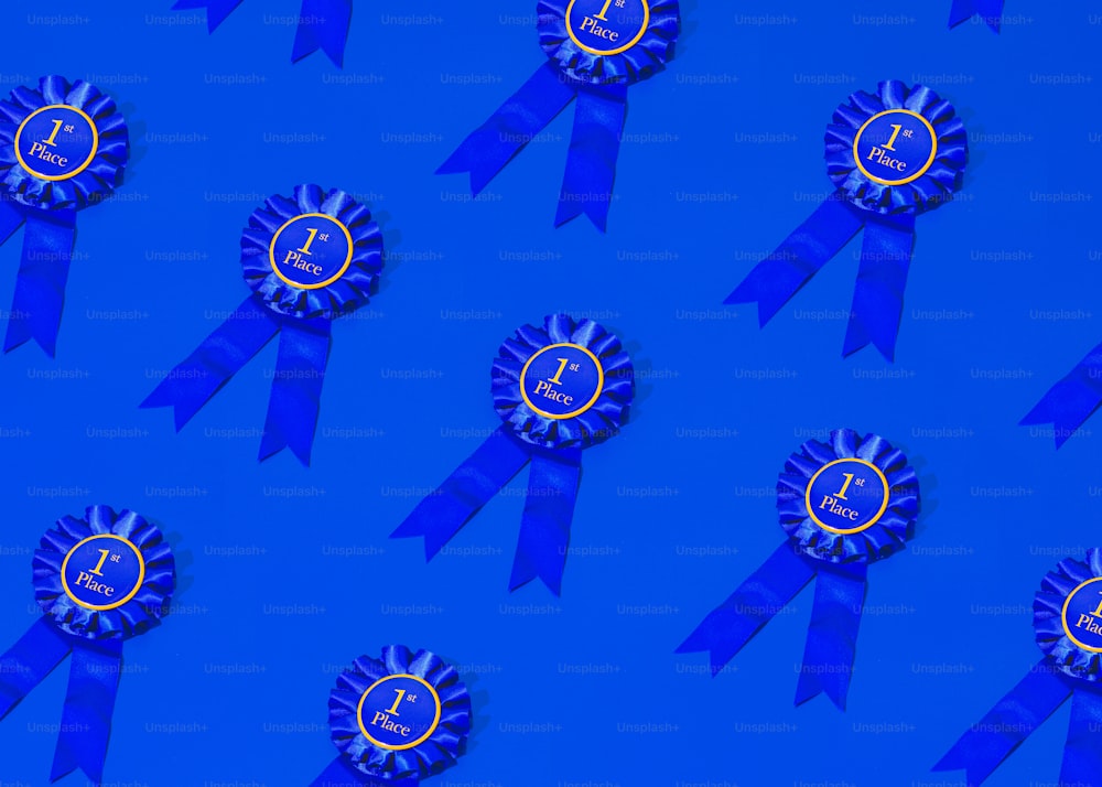 a group of blue ribbons with a clock on them