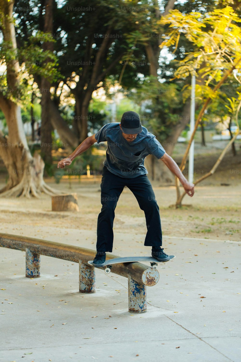 a man riding a skateboard on top of a wooden bench