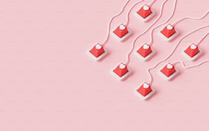 a group of red hearts connected to white wires