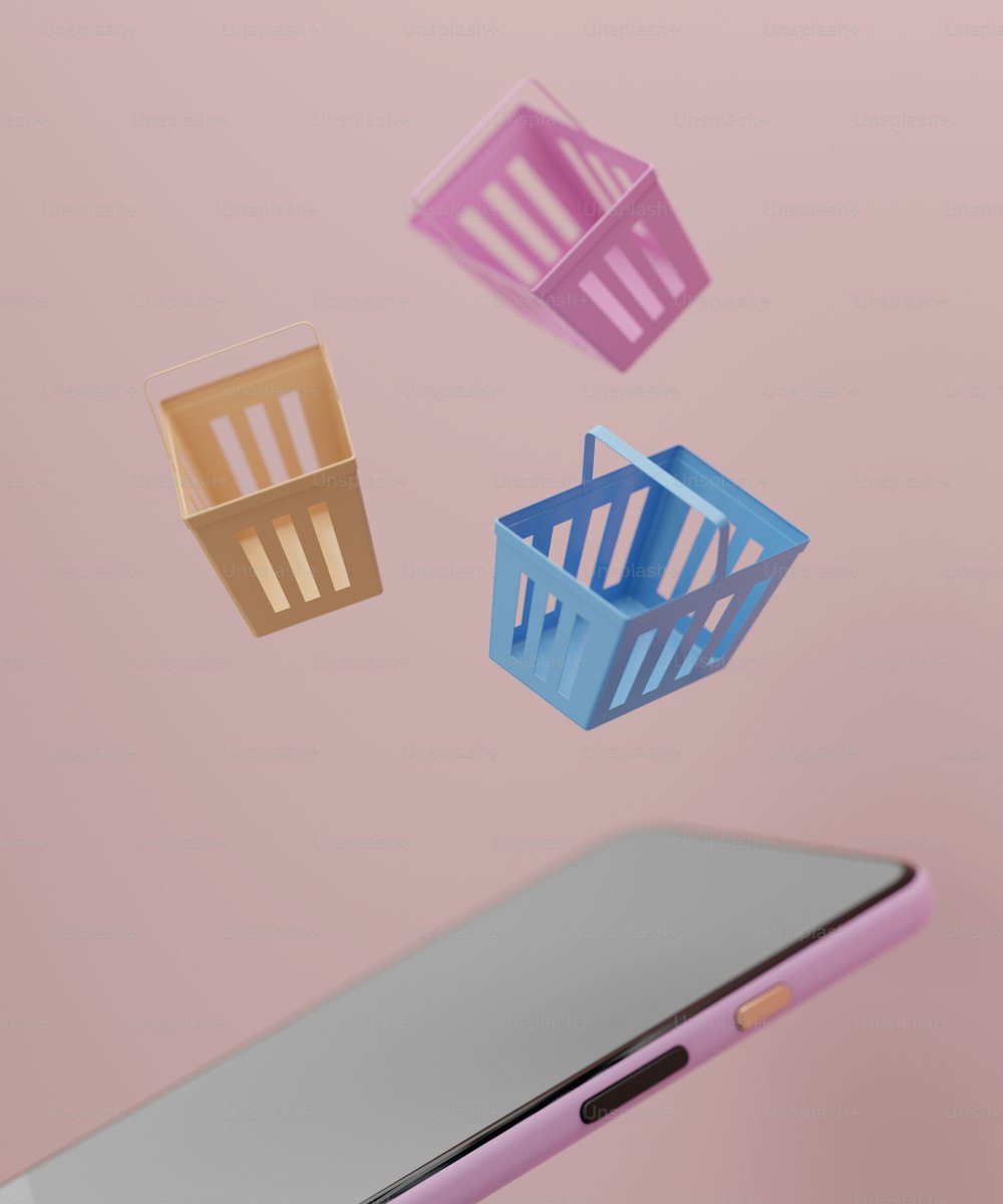 a cell phone with a basket floating above it
