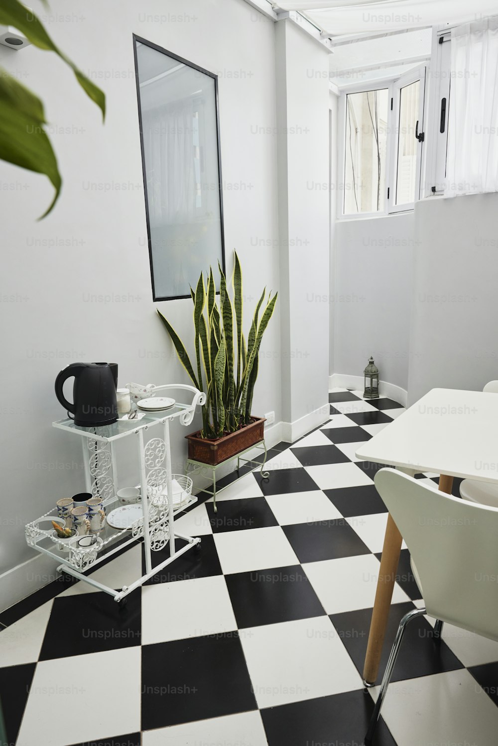 a black and white checkered floor in a room