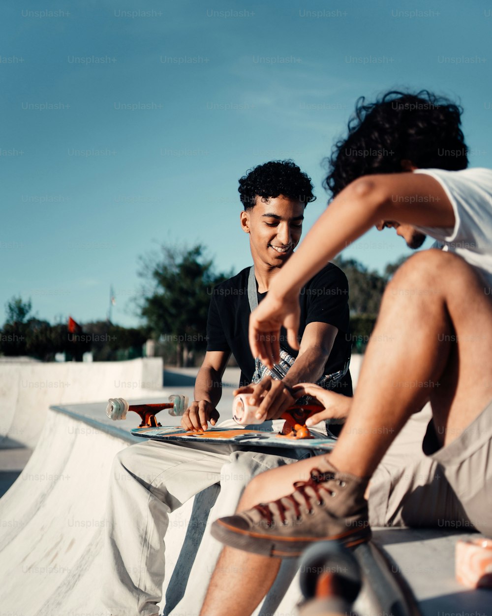 a couple of people sitting at a table