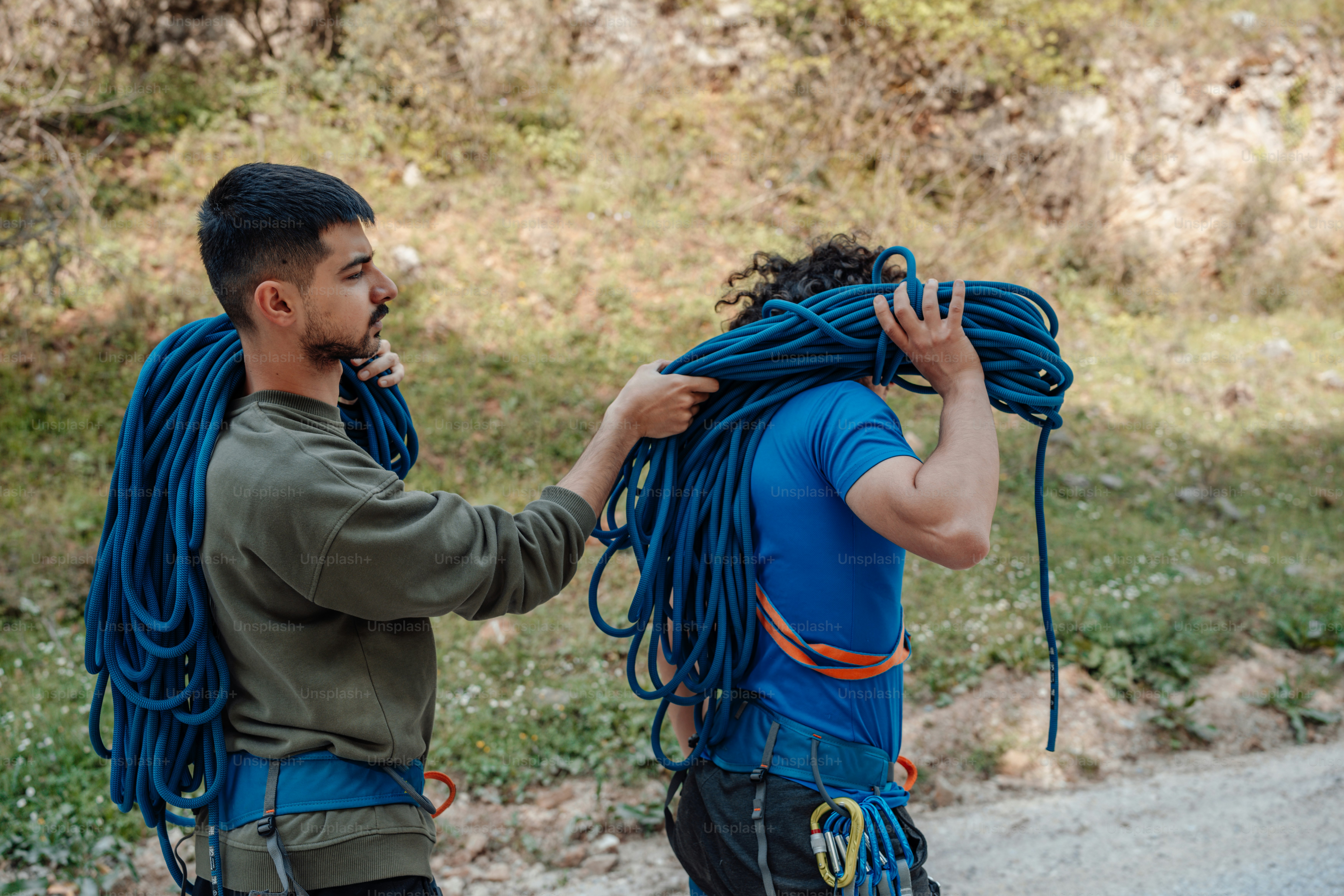 a couple of men standing next to each other