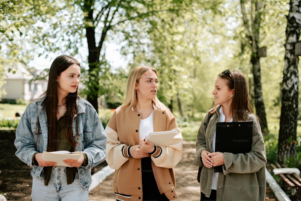 a group of young women standing next to each other