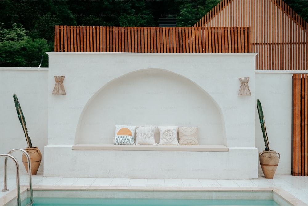 a pool with a bench next to it