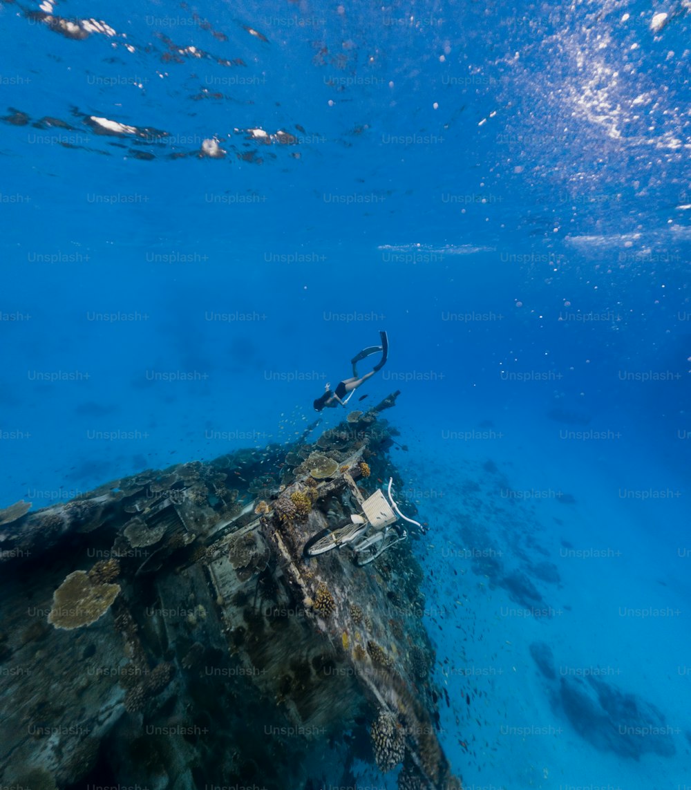 a boat in the water with a scuba mask on