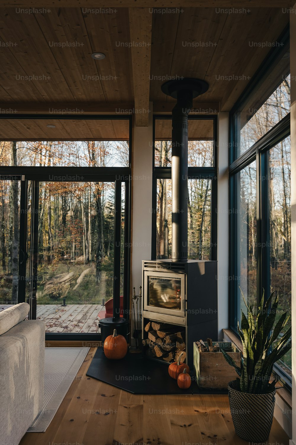 a living room with a wood burning stove