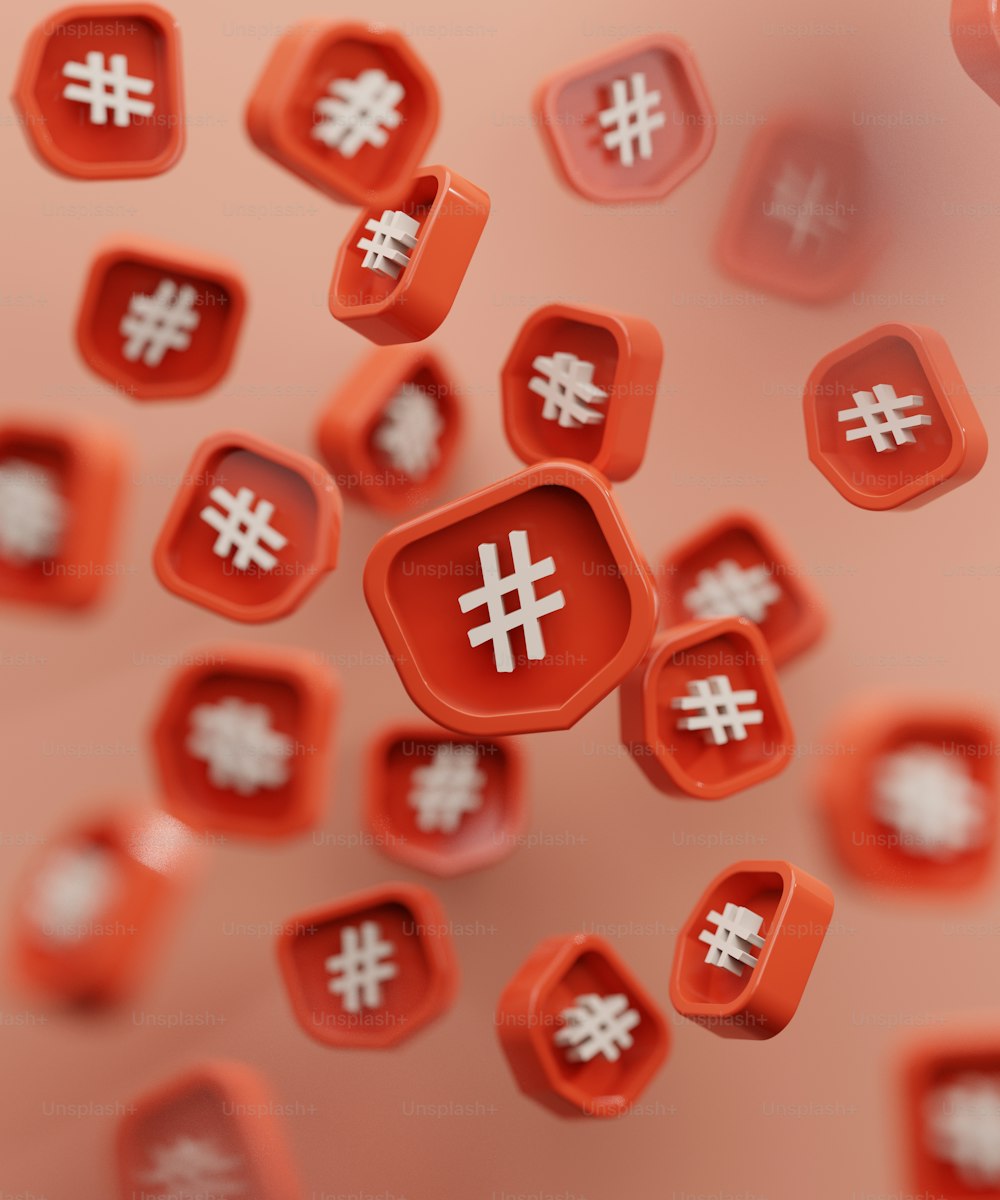 um monte de botões vermelhos com símbolos de hash branco neles