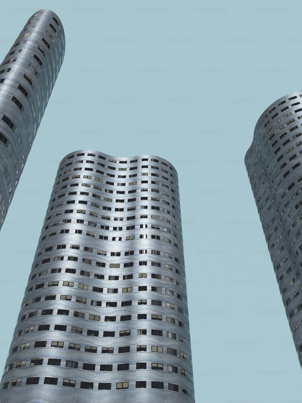 un paio di edifici alti seduti uno accanto all'altro