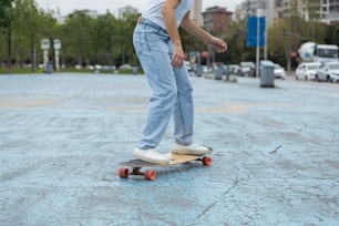 a person riding a skateboard on a city street