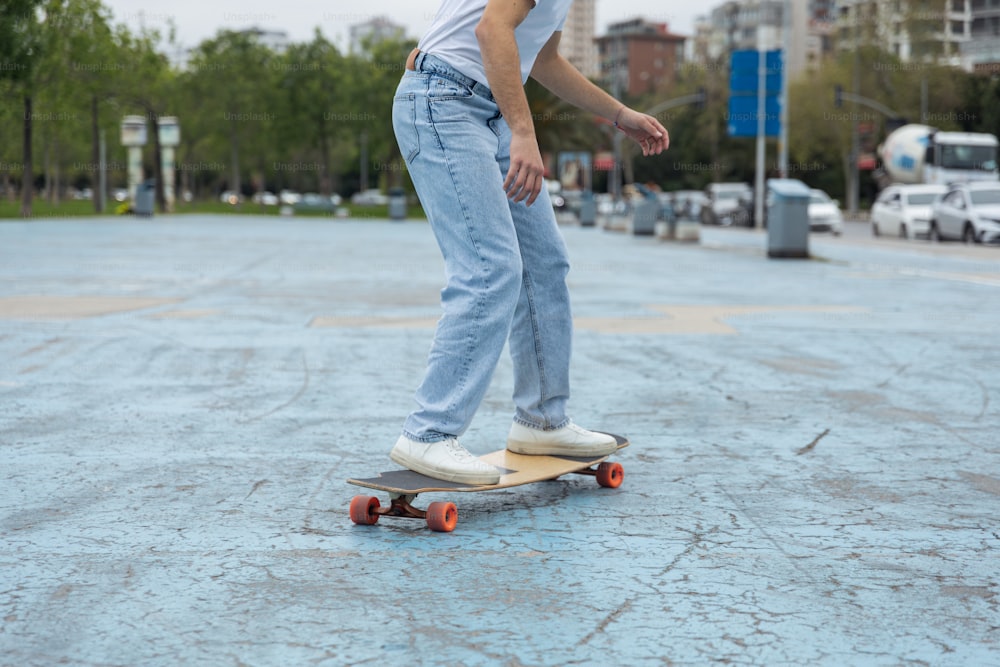 a person riding a skateboard on a city street