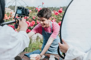 a man taking a picture of another man with a camera