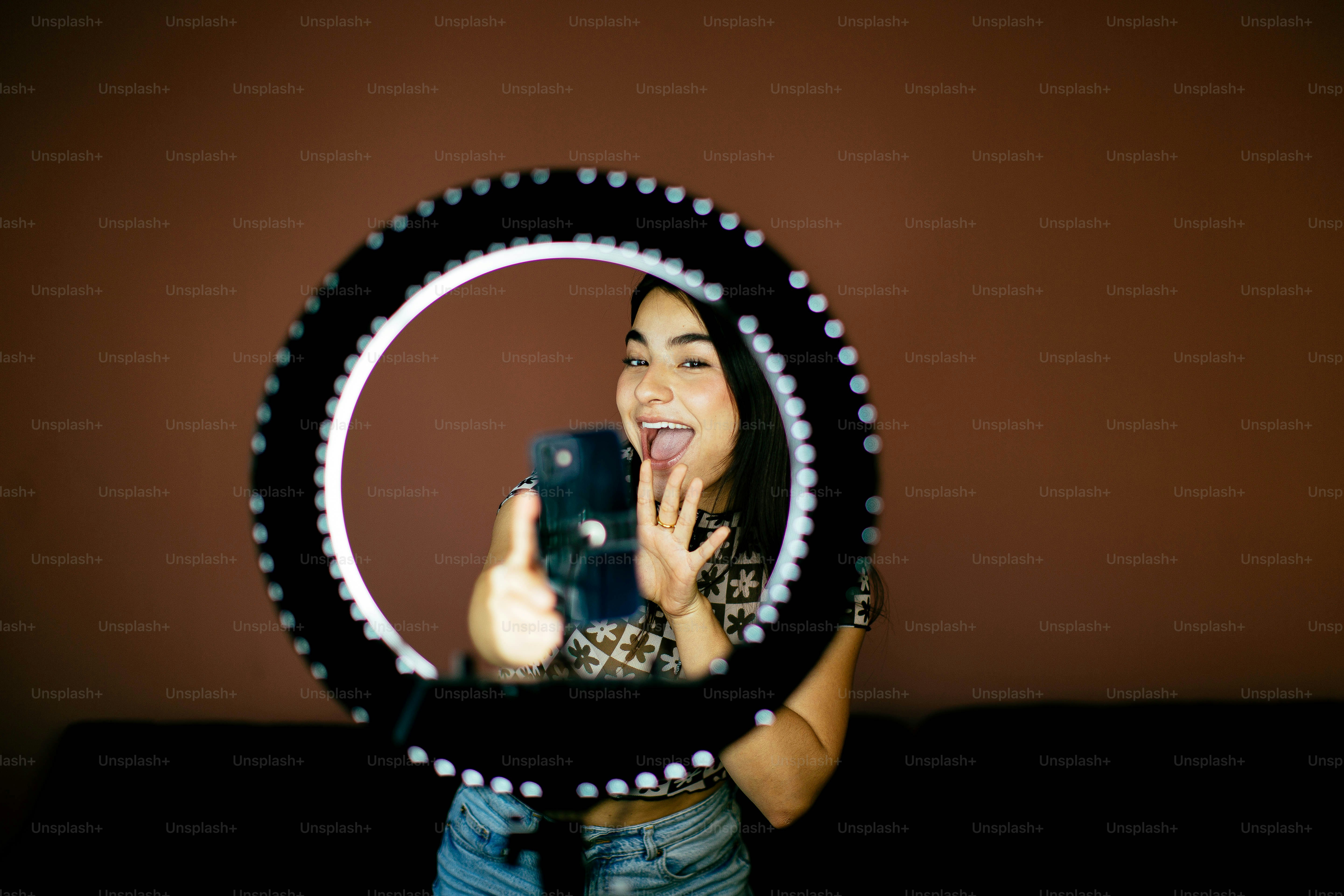 a woman taking a picture of herself in a mirror