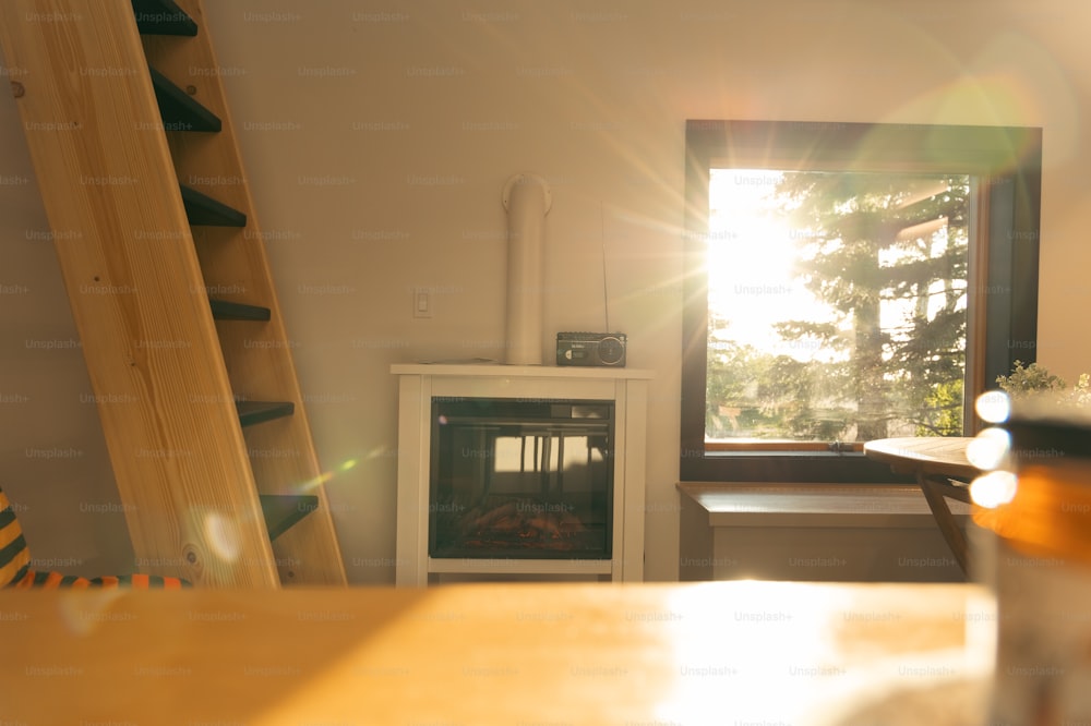 a kitchen with a stove and a window