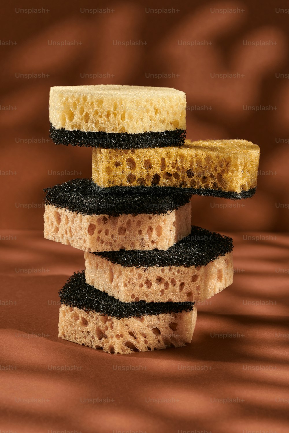 a stack of sponge cakes sitting on top of each other