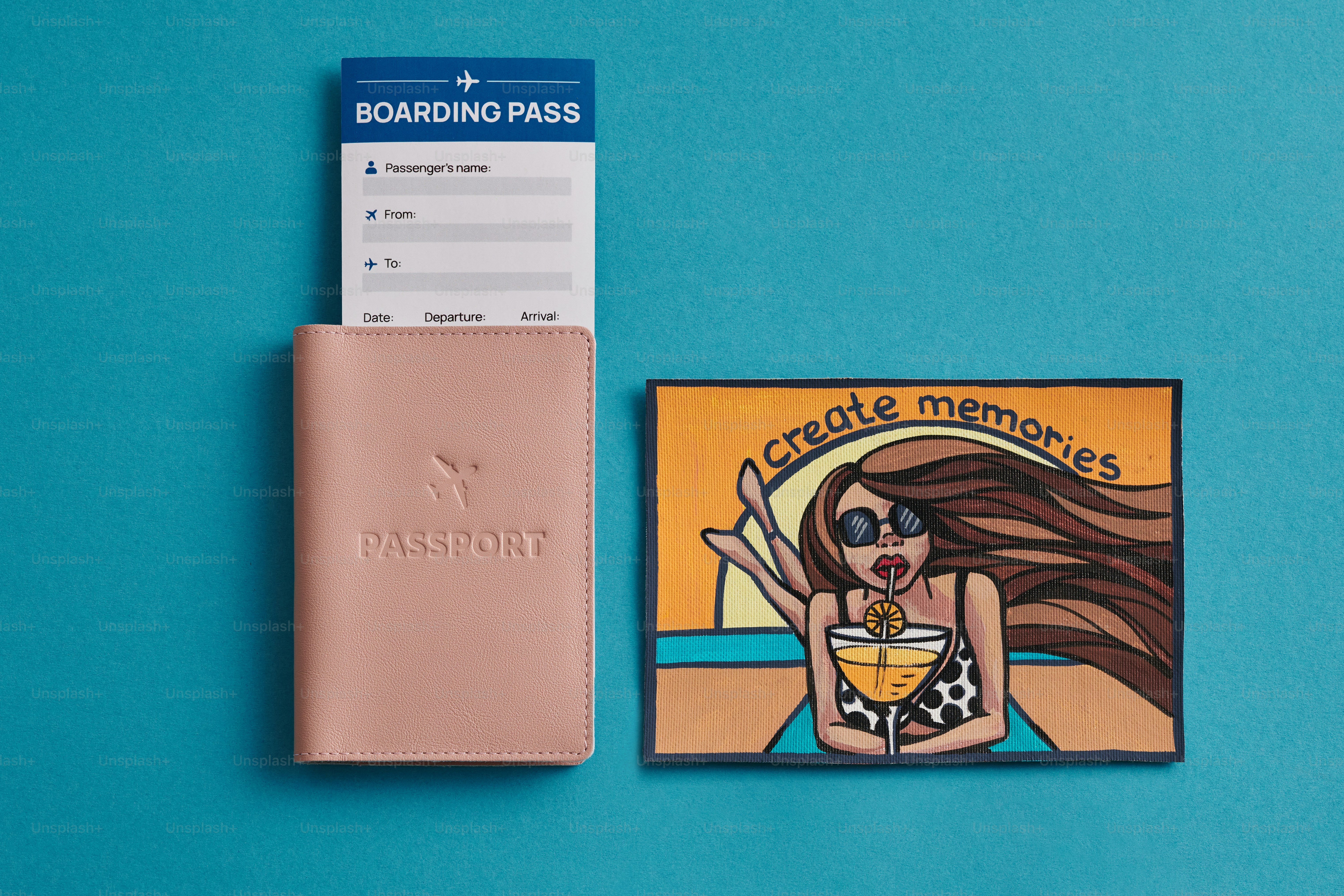 Flat Lay with airline ticket passport and postcard on blue background