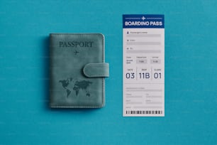 a passport sitting next to a boarding pass