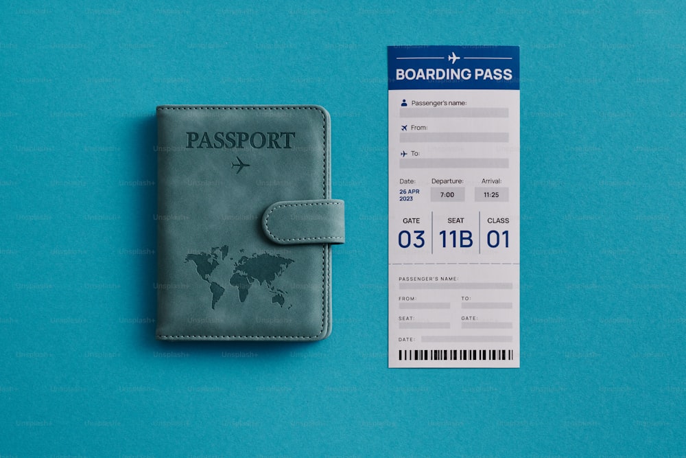 a passport sitting next to a boarding pass