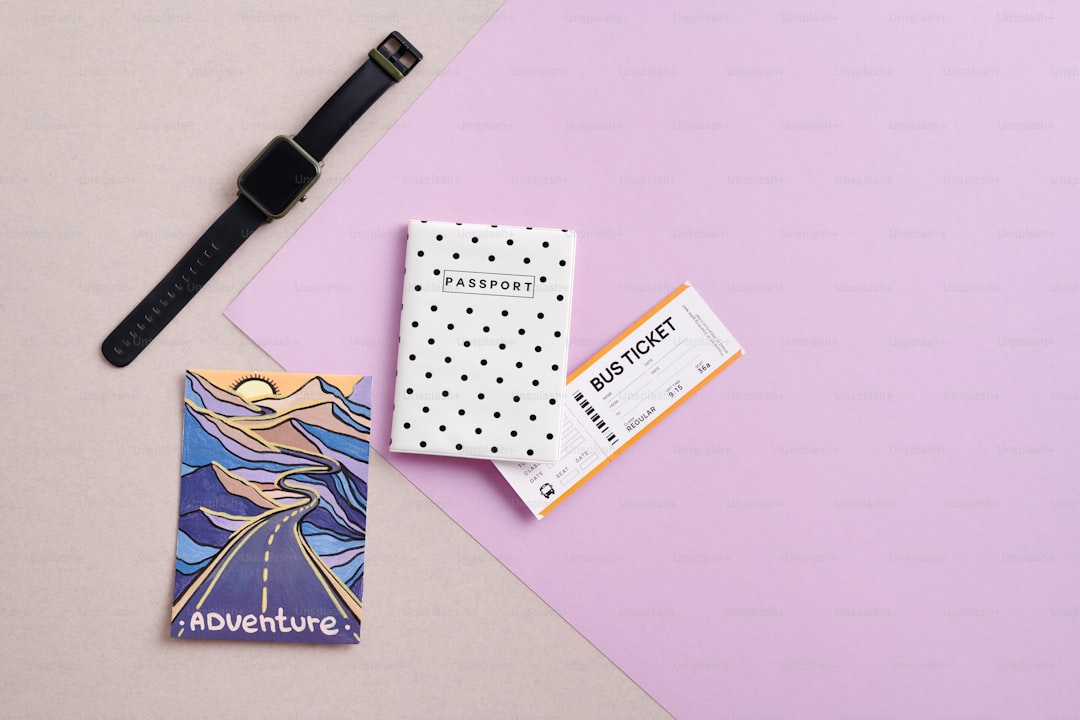 a pair of business cards sitting on top of a table