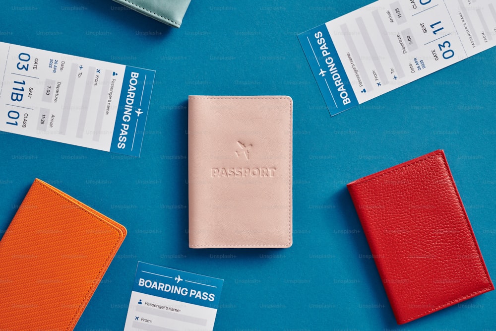 a passport case sitting on top of a blue table