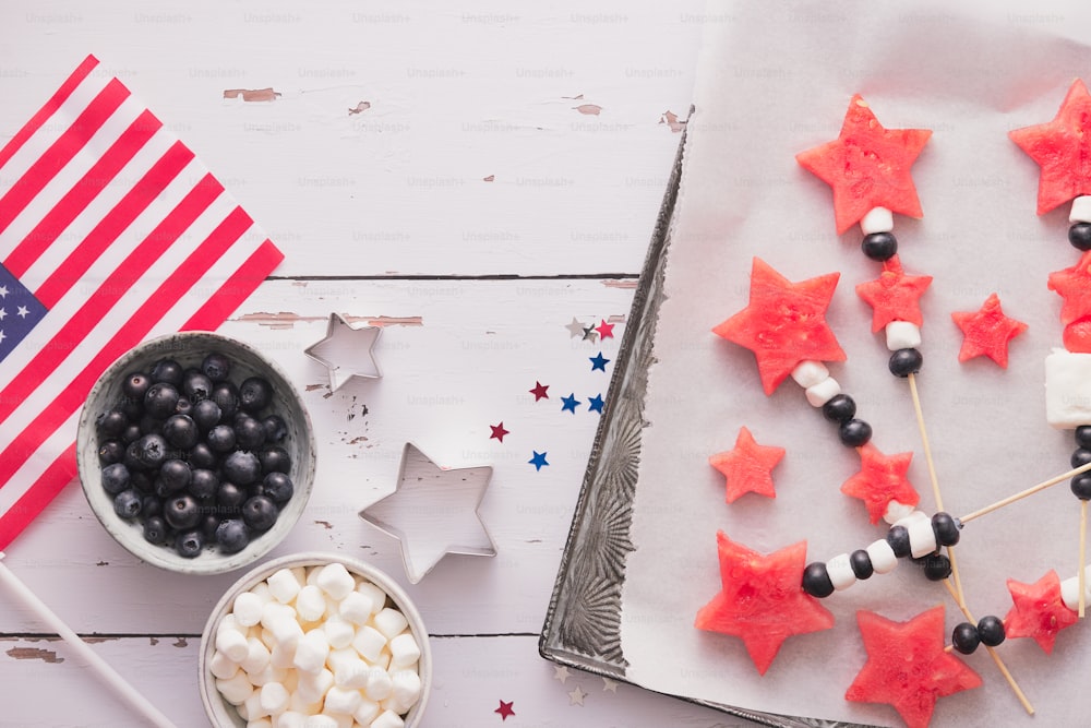 red, white and blue stars and a bowl of blueberries