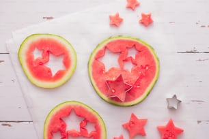 watermelon slices with stars cut out of them