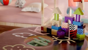 a child's room with a pink bed and toys