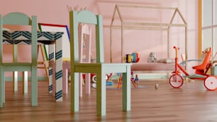 a group of children's toys sitting on top of a hard wood floor