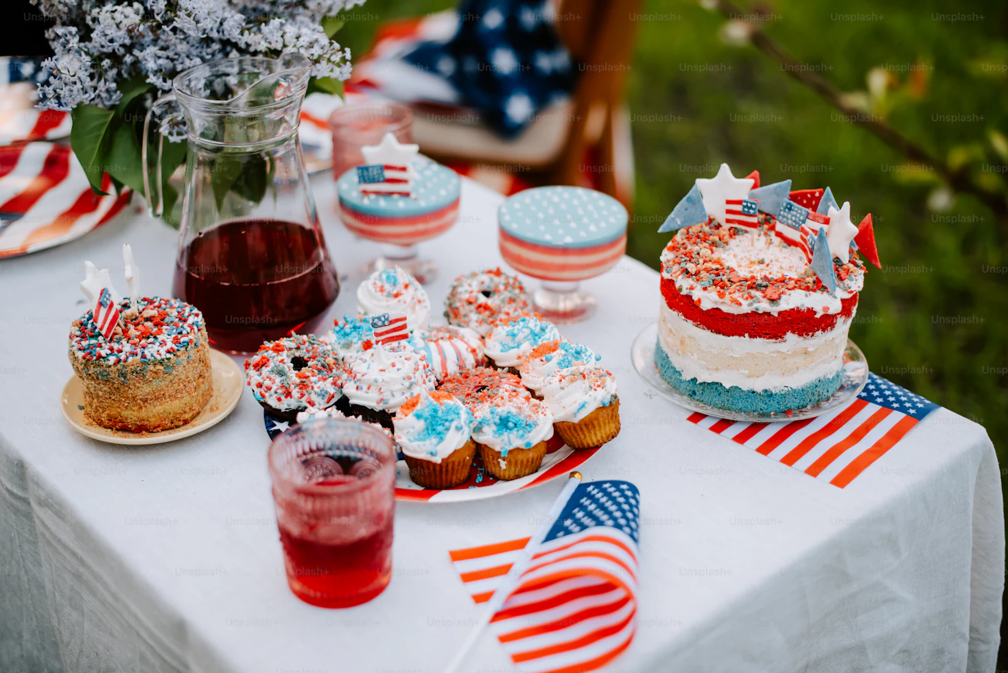 Delicious festive cupcakes with bright red, white, and blue frosting toppings